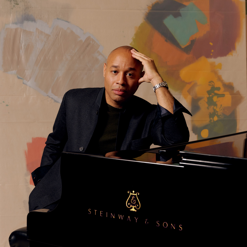Photo of Aaron Diehl at a piano